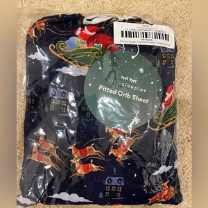 New in bag - Little Sleepies Santa Sleigh standard crib sheet
